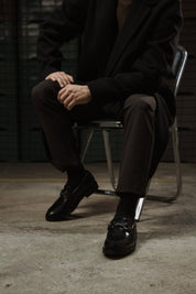 MOCASIN MELCHOR DE PIEL NEGRO CON HERRAJE