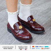 SANDRO PENNY LOAFER PIEL BURGUNDY