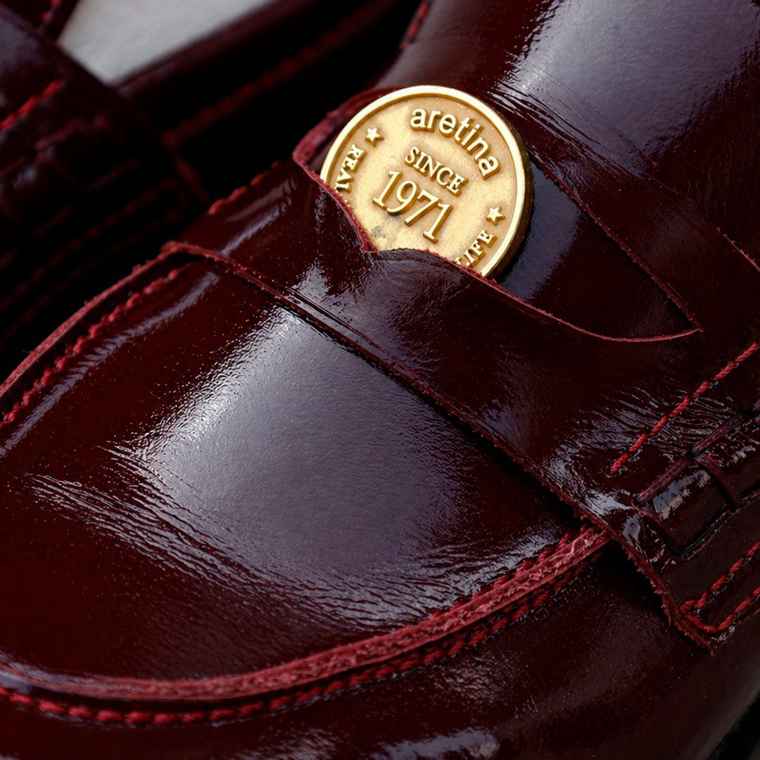 SANDRO PENNY LOAFER PIEL BURGUNDY